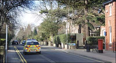 Hawthorne Lane and Police Car